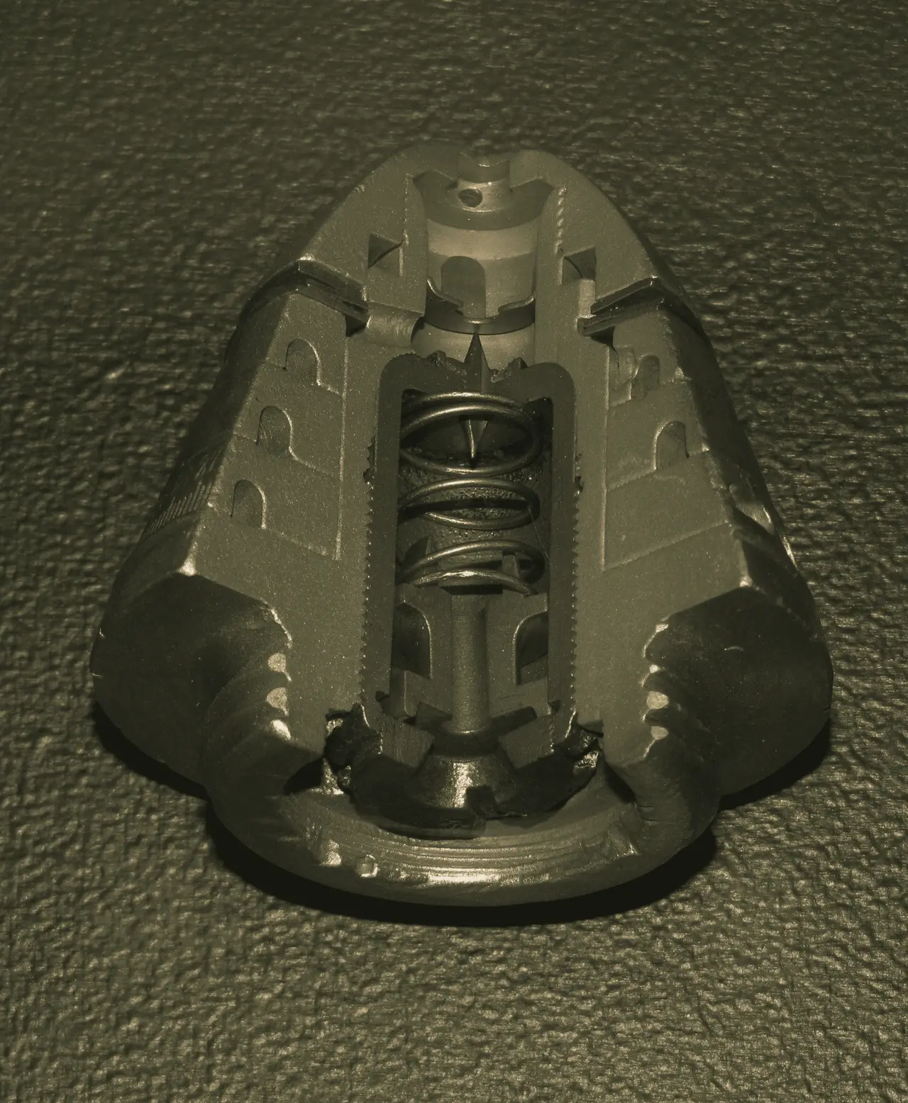 Artillery fuze, cut away to show its mechanism